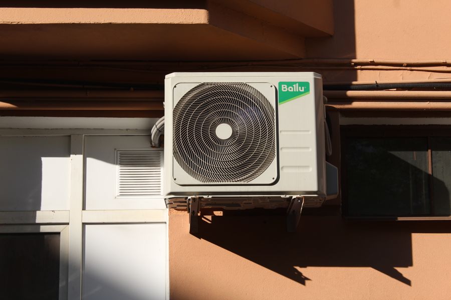 Outdoor AC condenser unit installation in Sarasota
